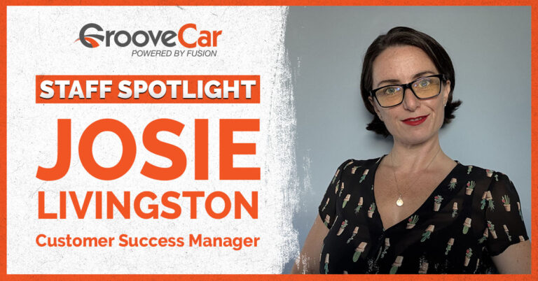 GrooveCar Staff Spotlight highlighting Josie Livingston, Customer Success Manager, wearing glasses and a black blouse with potted plant print, smiling in front of a blue-gray background.